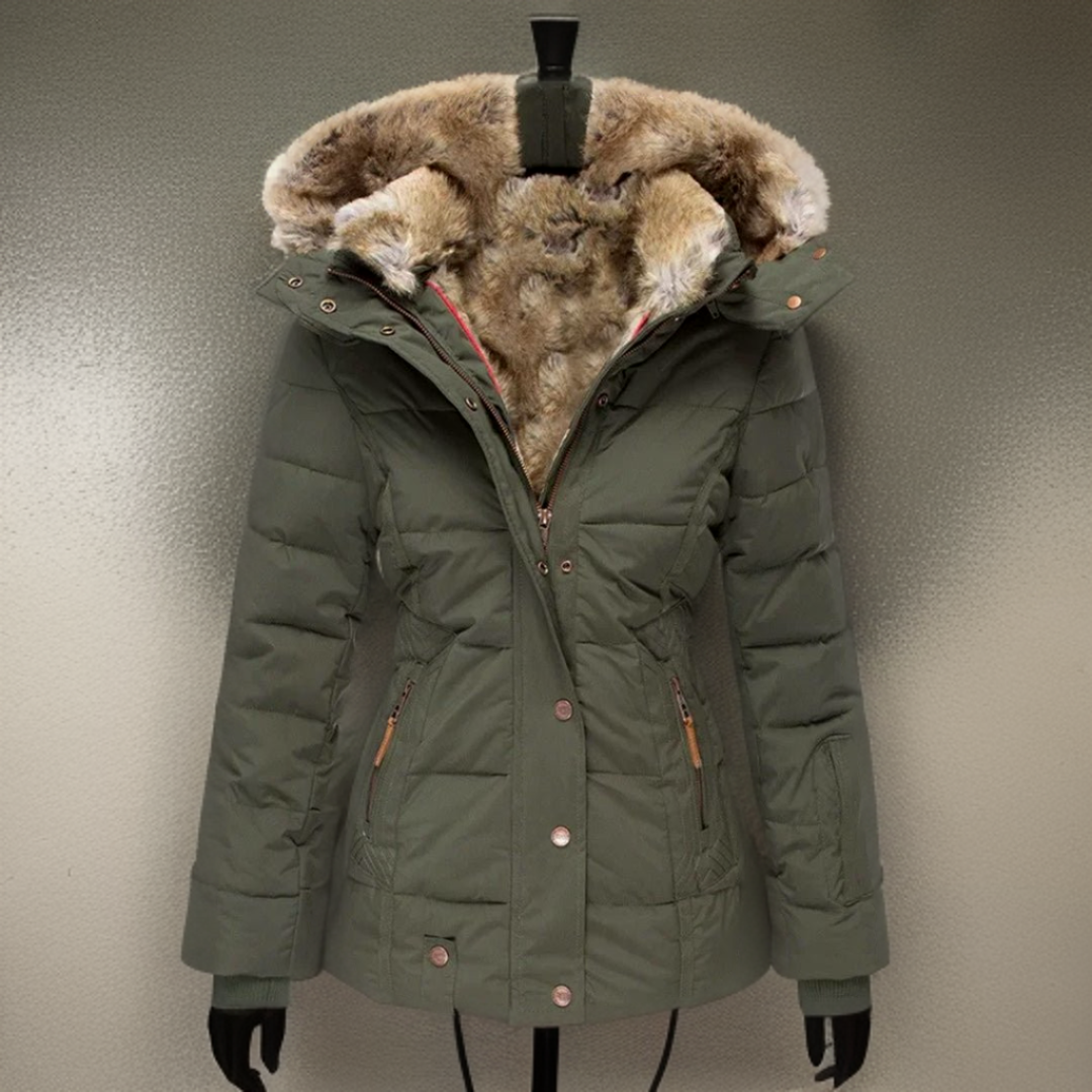 Green women's winter coat Elodie with faux fur hood on display