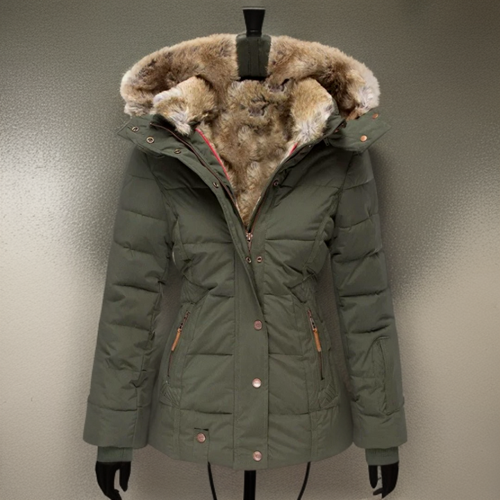 Green women's winter coat Elodie with faux fur hood on display