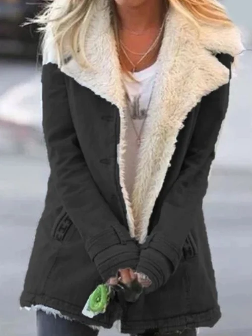 Back view of women's comfortable thermal winter jacket