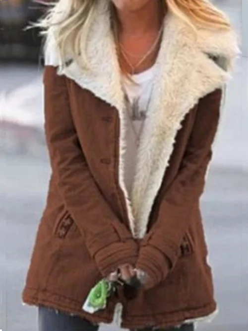 Close-up of weather resistant material on women's winter coat
