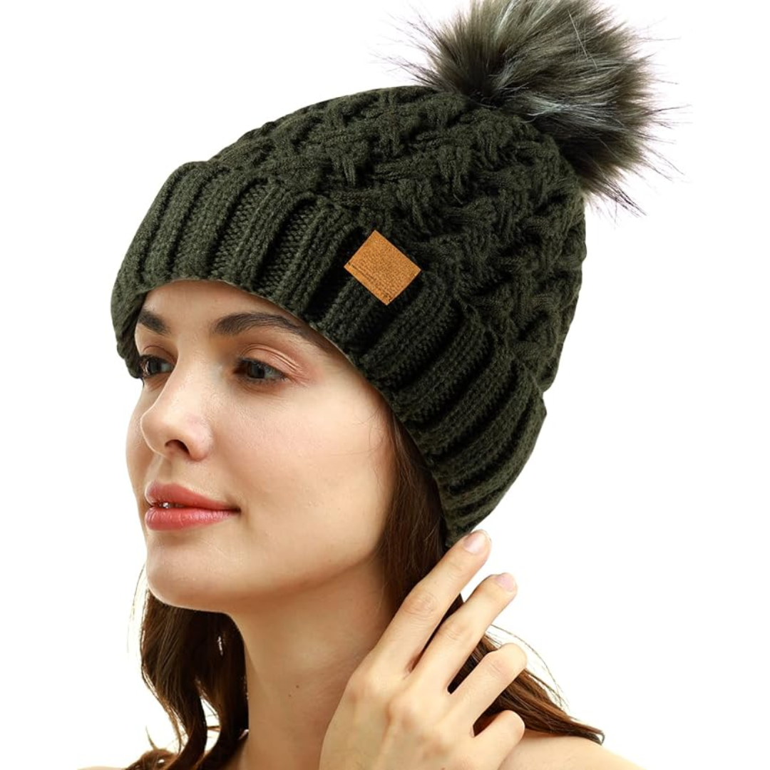 Cozy knit winter hat Yvonne with fluffy faux fur pom pom