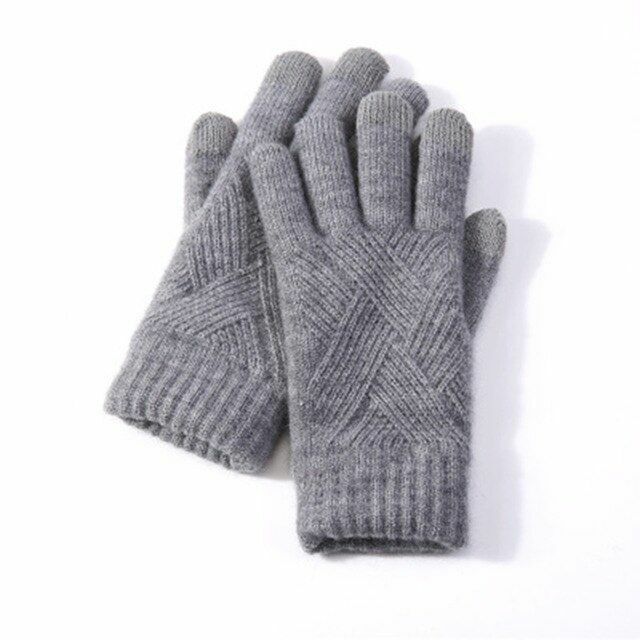 Pair of light grey knitted women's gloves