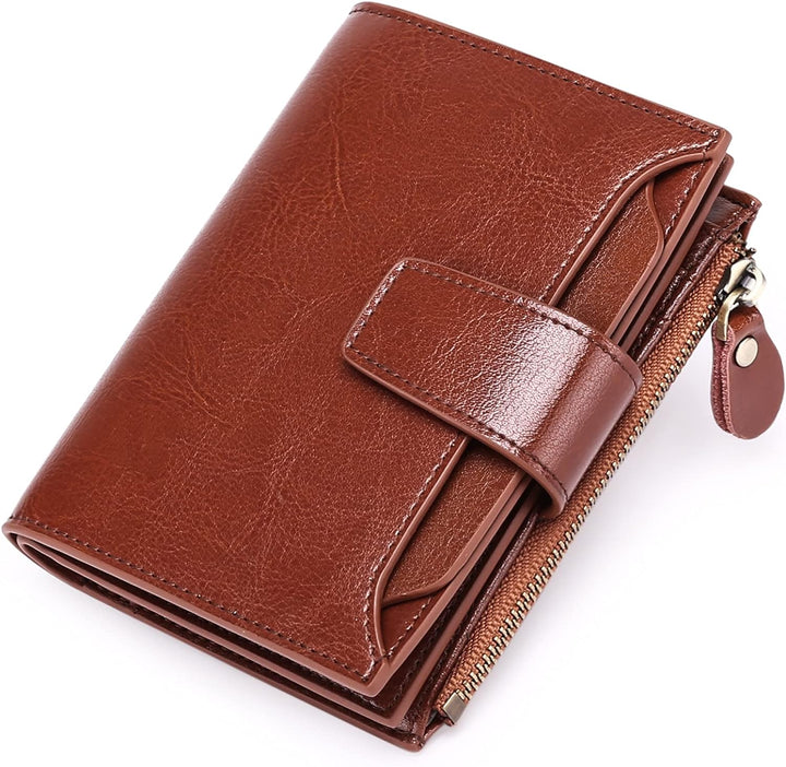Brown compact multi-pocket wallet for women showing front strap and zipper pocket
