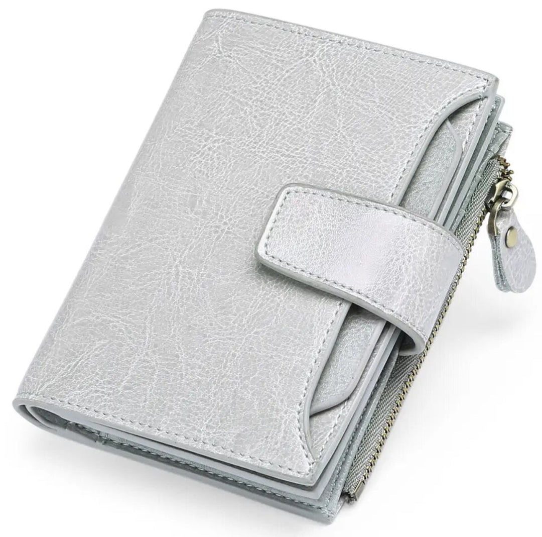 Zippered coin purse section of womens small multi-pocket leather wallet