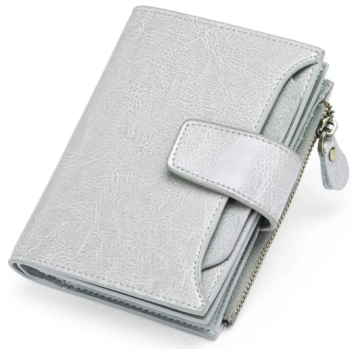 Zippered coin purse section of womens small multi-pocket leather wallet