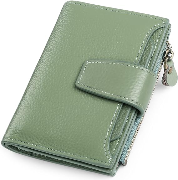 Light green compact multi-pocket wallet showing textured surface and snap closure