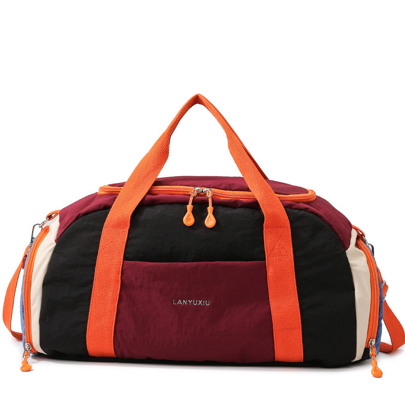 Overhead view of unisex compact sports duffle bag ready for travel