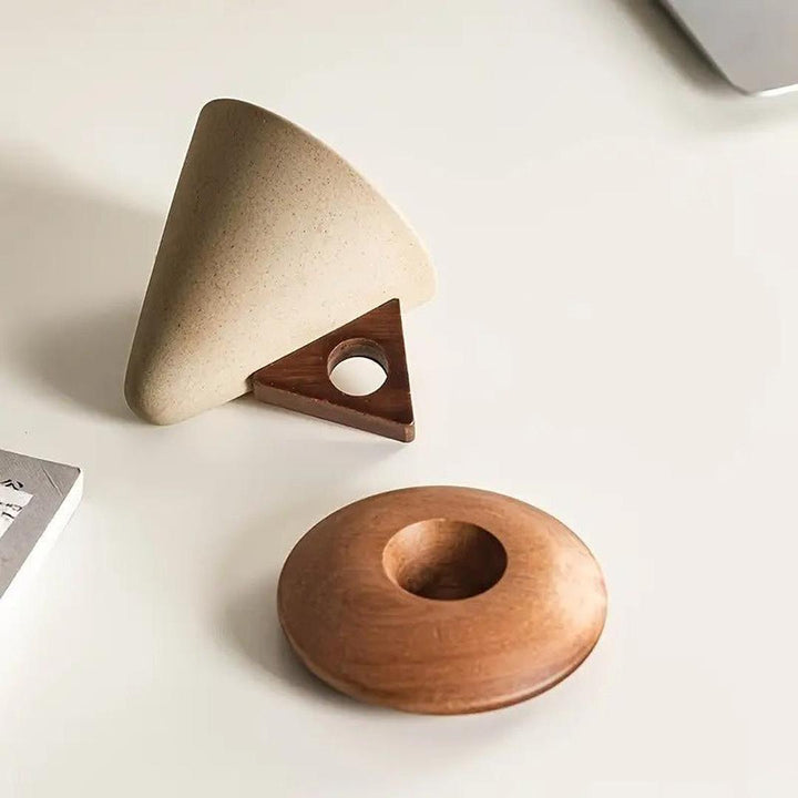 Modern ceramic conical coffee cup with matching wooden coaster for kitchen decor