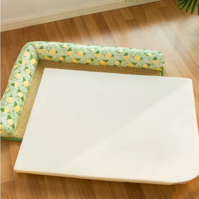Cooling pet mat with raised edge viewed from above showing breathable summer cat bed design