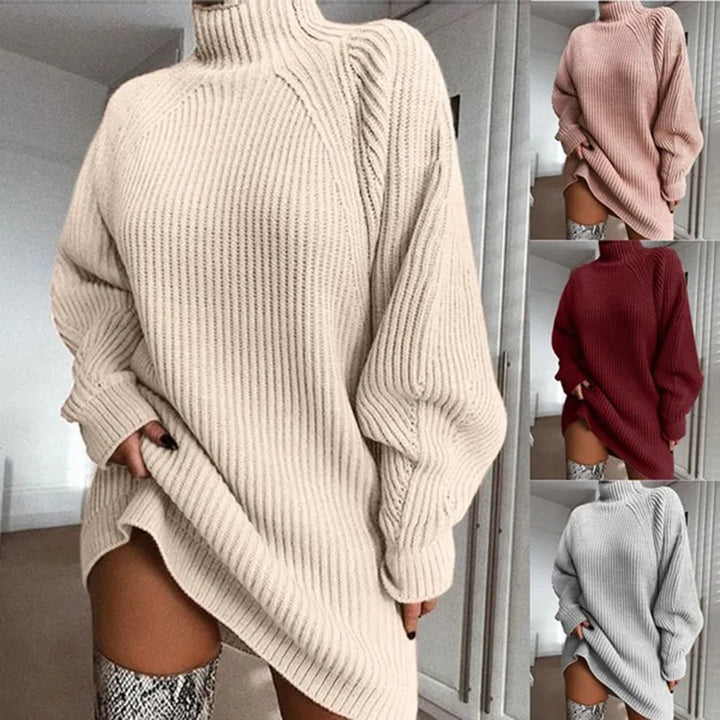 Woman wearing a beige turtleneck knit dress with long sleeves