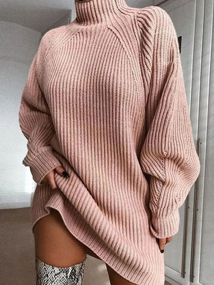 Close-up of woman in a pink turtleneck knit dress