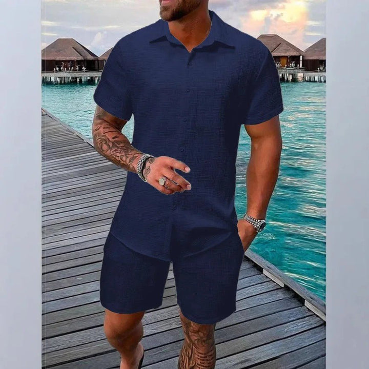 Mens summer outfit showing the textured fabric of the shirt and shorts set
