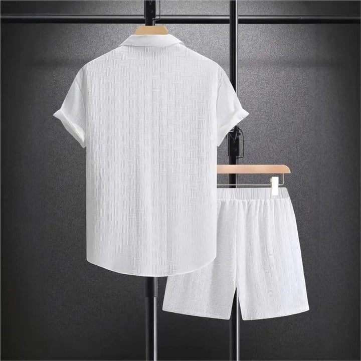 Back view of the white short-sleeve shirt and matching shorts set