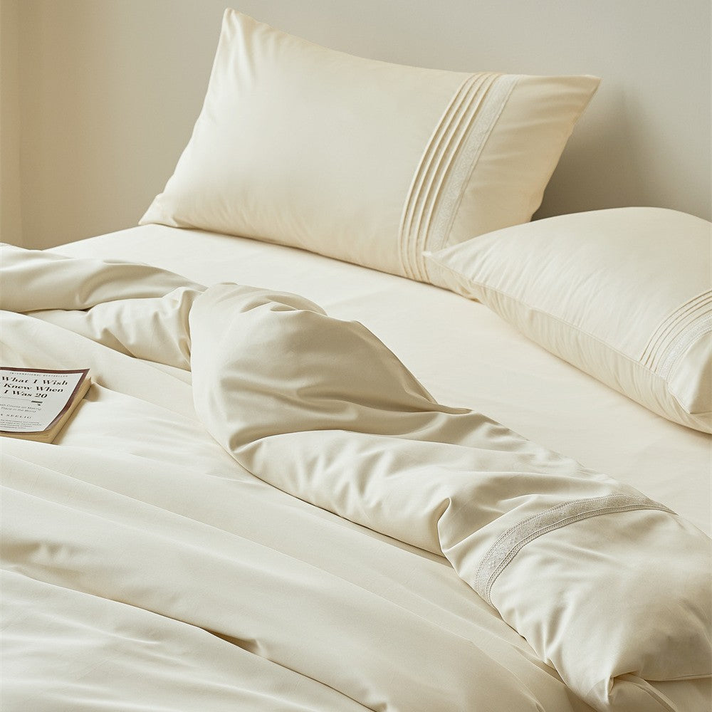 Elegant bedroom decor featuring a soft lace trimmed duvet cover
