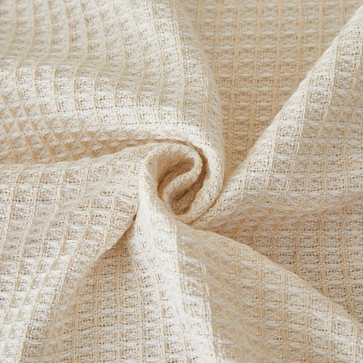Universal armchair cover showcasing stretchy fabric and snug fit
