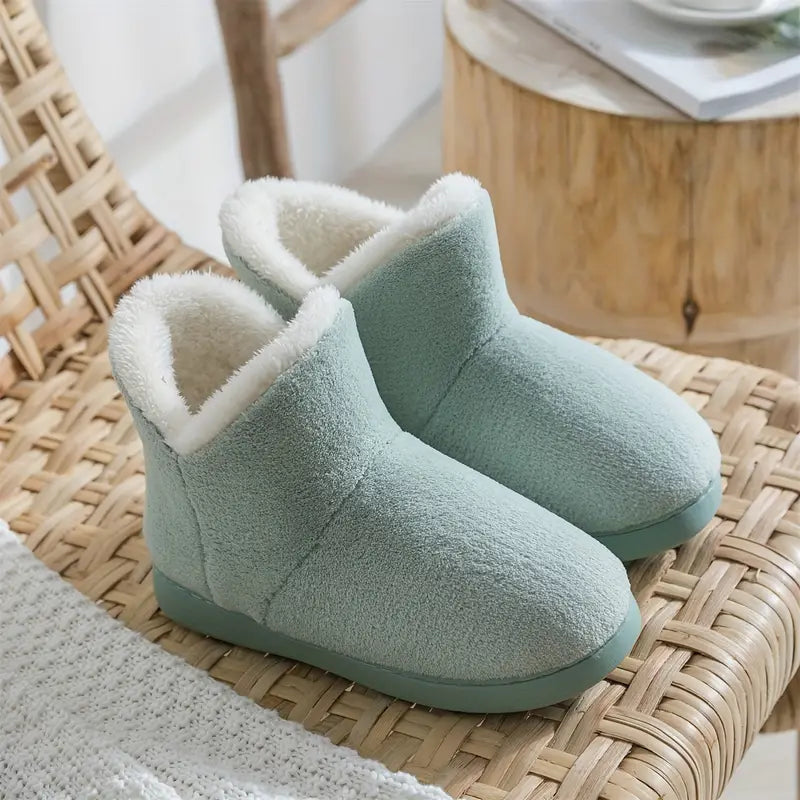 Women's cozy lined ankle boot slippers in soft knit fabric for indoor winter wear