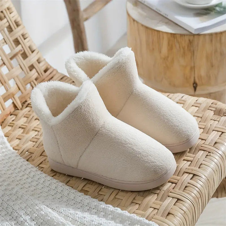 Warm house shoes and winter slippers styled as comfortable ankle booties for women