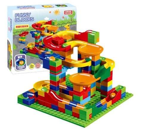 Marble run construction toy displayed alongside its product packaging box