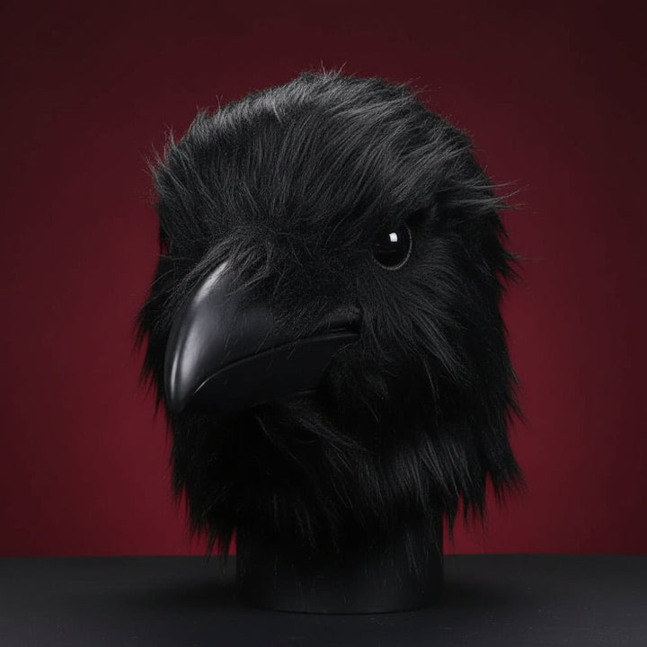 Studio display of the detailed black raven head mask on a mannequin