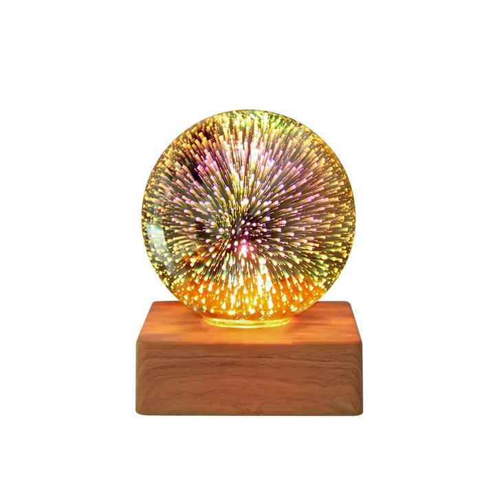 Ambient crystal ball night light glowing with colorful 3D firework effect in a dark bedroom