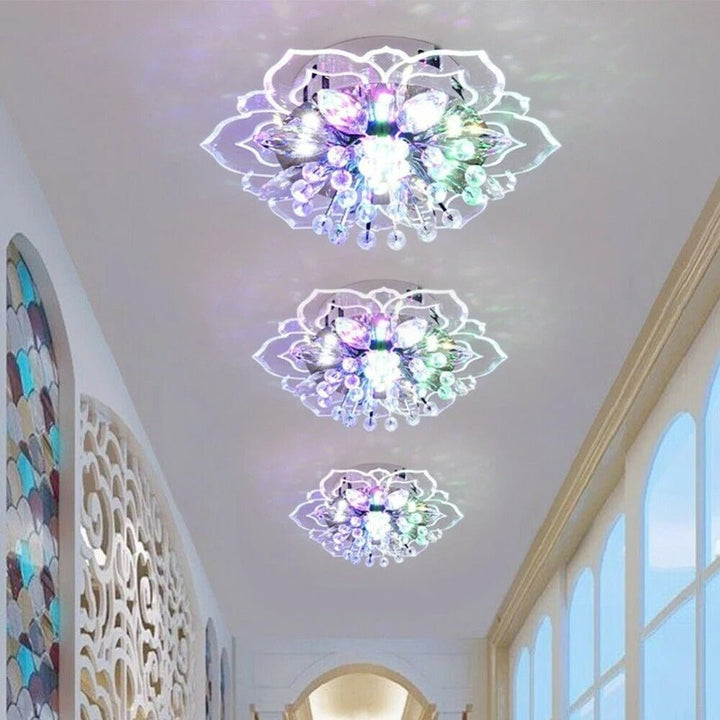 Hallway interior showcasing multiple crystal flower chandeliers illuminating the corridor