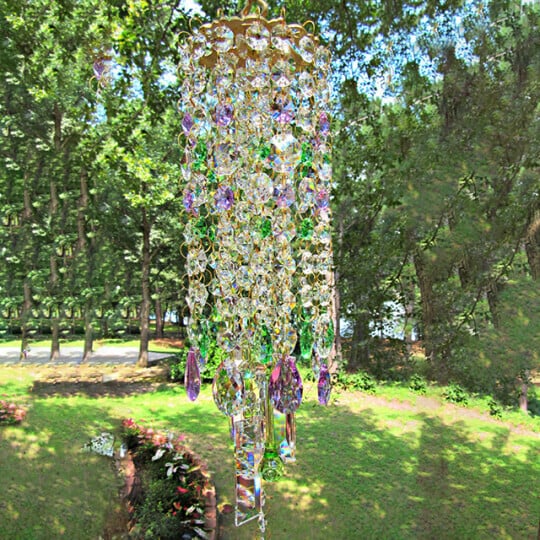 Elegant outdoor crystal wind chime swaying gently as a patio accessory