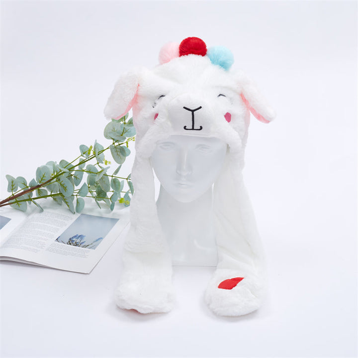 Interactive plush hat with paw-controlled moving ears
