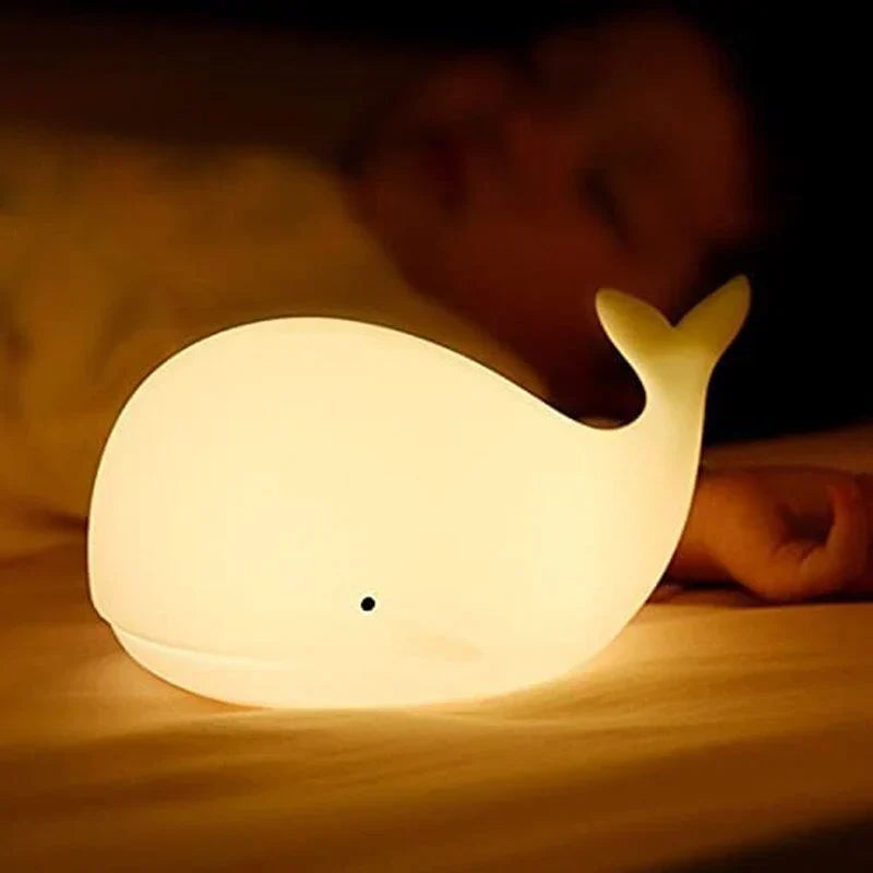 Childrens nursery decor whale lamp showing vibrant colour changing mode