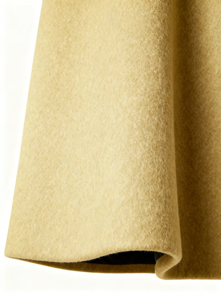 Collar popped up on the men's trench coat for a sharp, modern urban aesthetic.