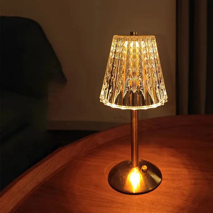 Rechargeable table lamp glowing softly in a cozy room setting