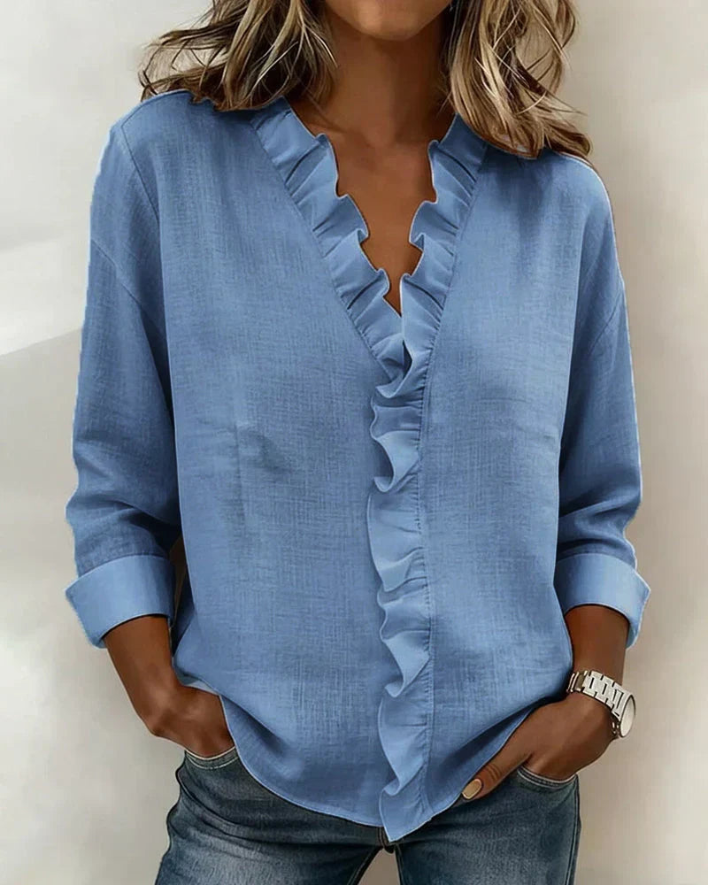 Womens lightweight v-neck ruffled blouse in casual style, front view