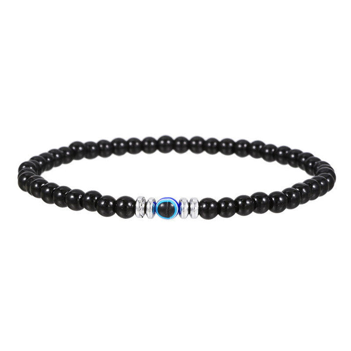 Mens natural stone evil eye beaded bracelet closeup view on wrist