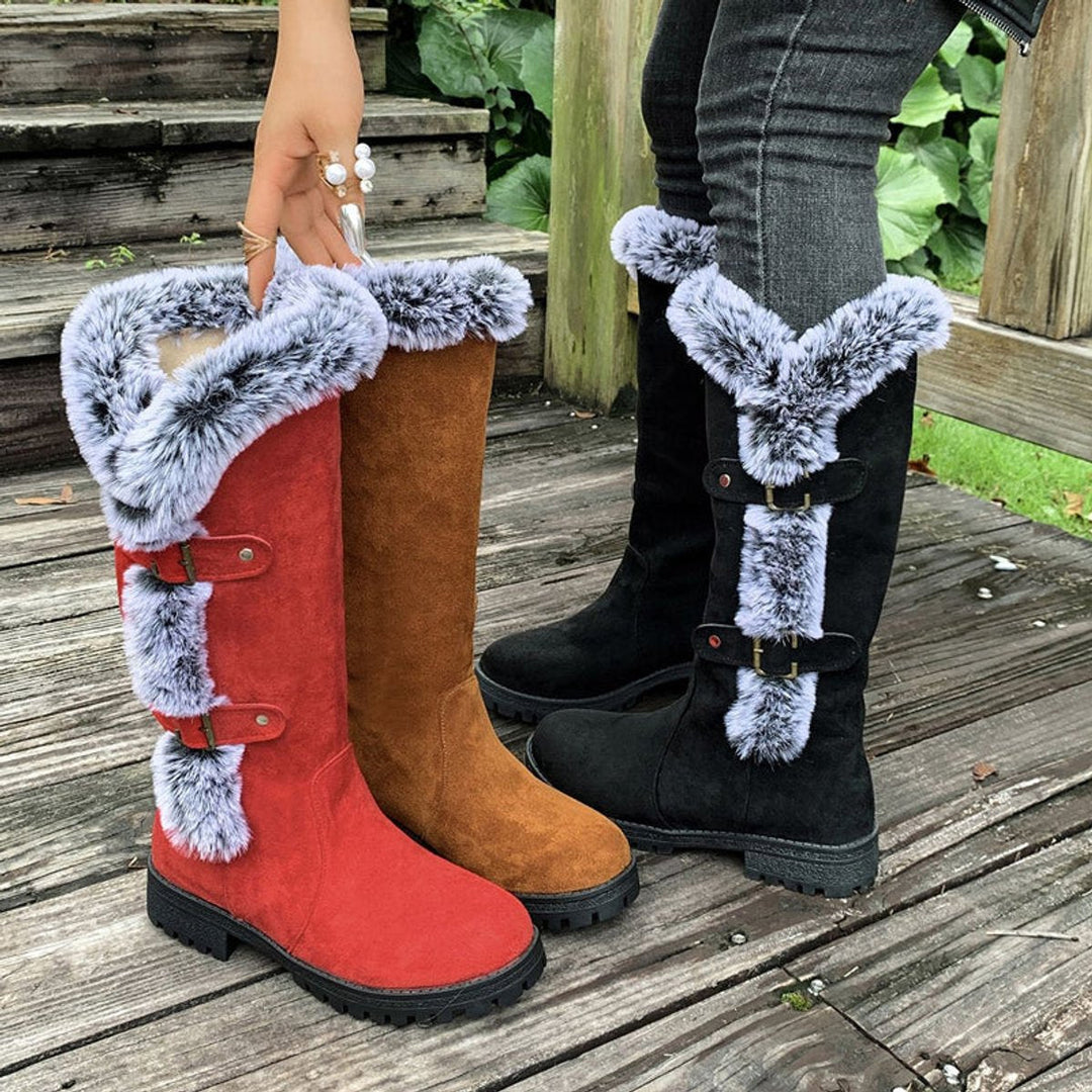 Back view of winter boots showing warm fur trim and low heel