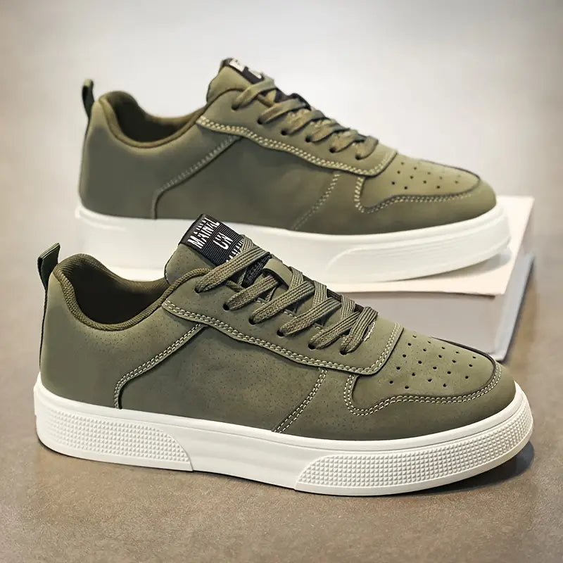 Stylish black casual sneakers for men, top-down view