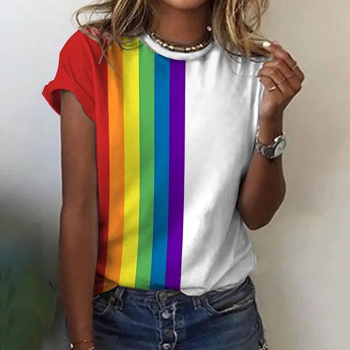 Woman wearing white short-sleeve T-shirt with vibrant rainbow print vertical stripes