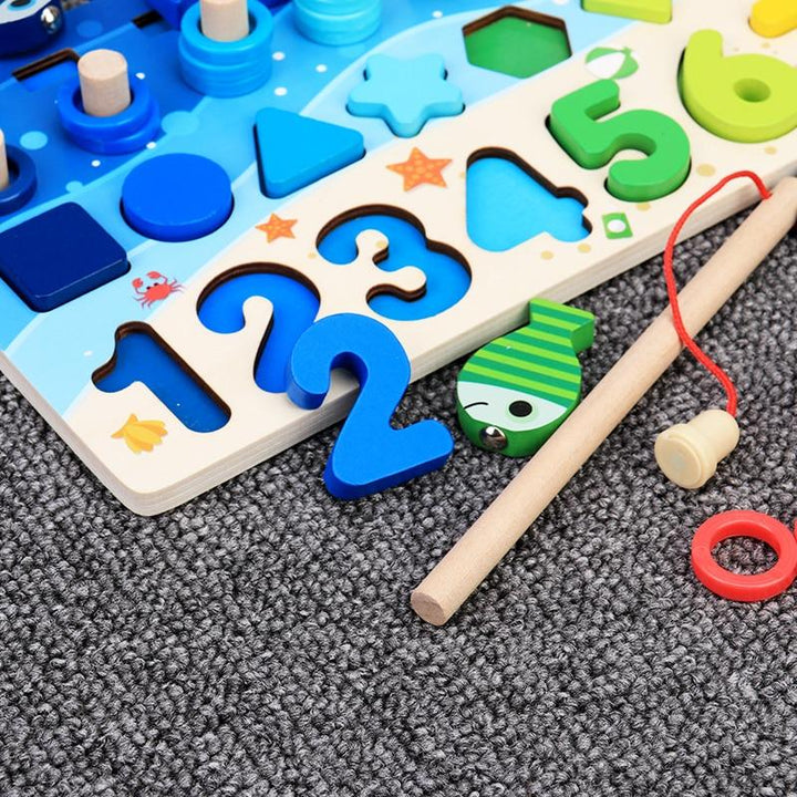 Detailed view of the number slots and geometric shape sorting area on the board