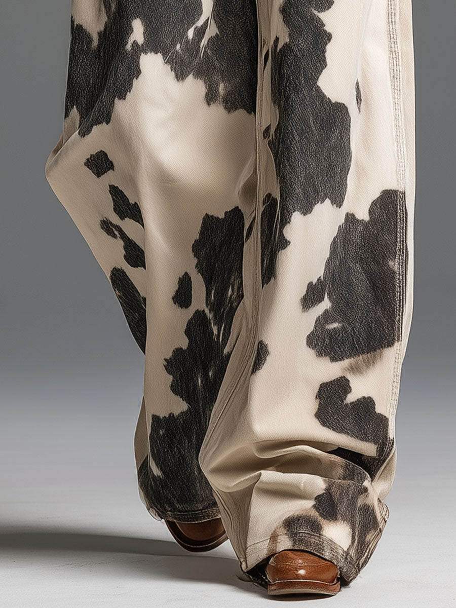 Detailed view of women's retro cow print trousers in beige casual wear