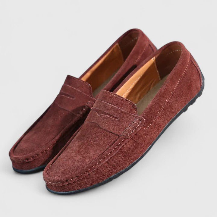 Side profile of men's premium everyday comfort loafer in brown leather
