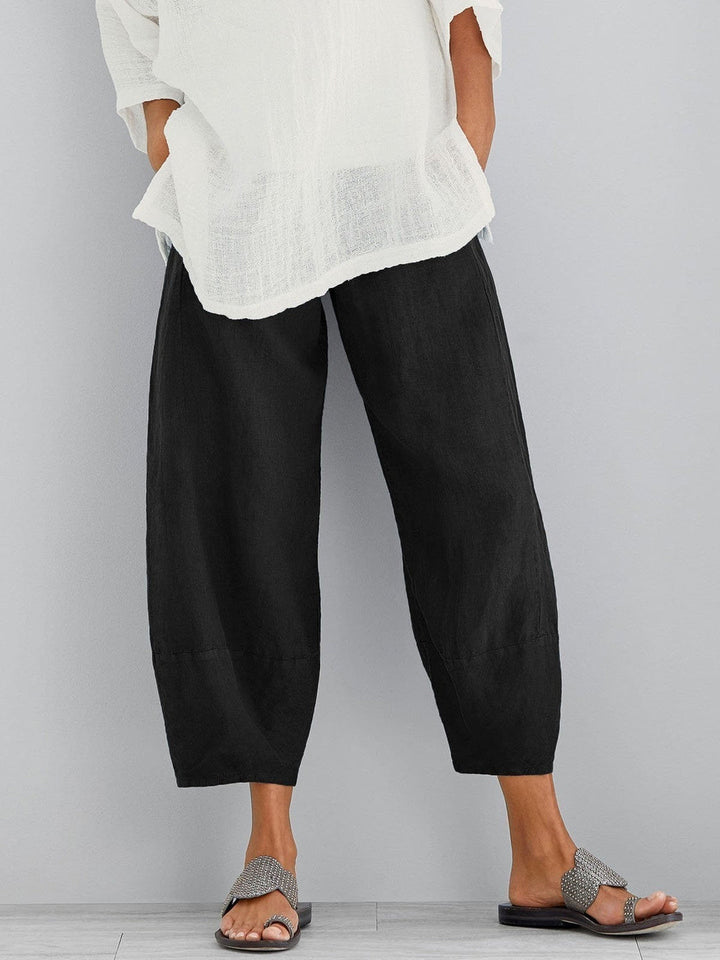 Side angle of relaxed fit cropped trousers for women styled for everyday casual wear