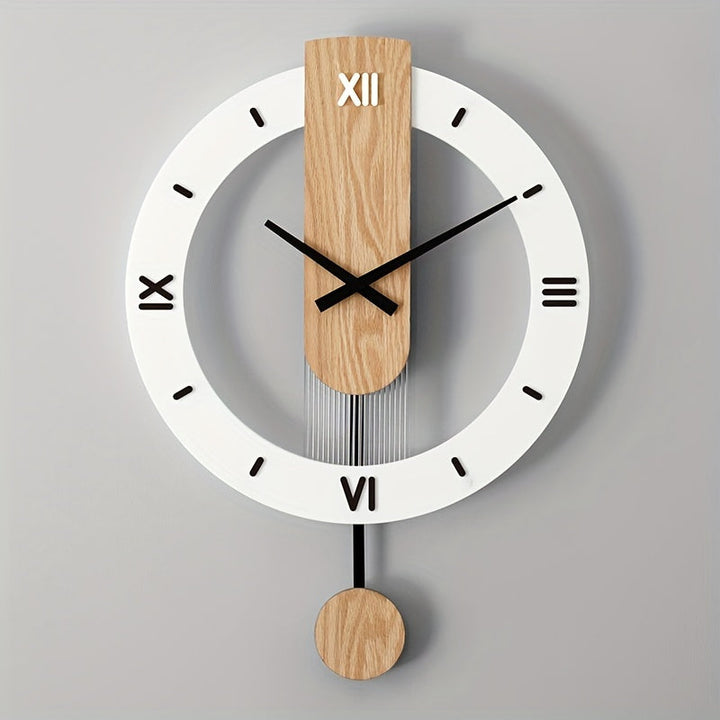 Roman numeral wooden and acrylic pendulum wall clock mounted on a grey wall