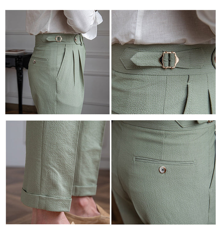 Close-up of pleated waist detail and fabric texture on stylish cropped pants