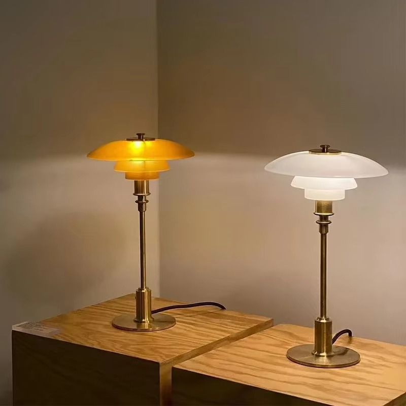 Modern bedside lamp with sleek design emitting warm indoor lighting
