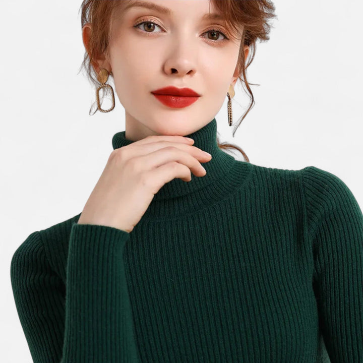Stylized view of women's winter turtleneck paired with denim