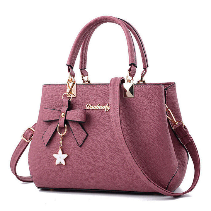 Lifestyle shot of women's stylish shoulder handbag accessorized for street style