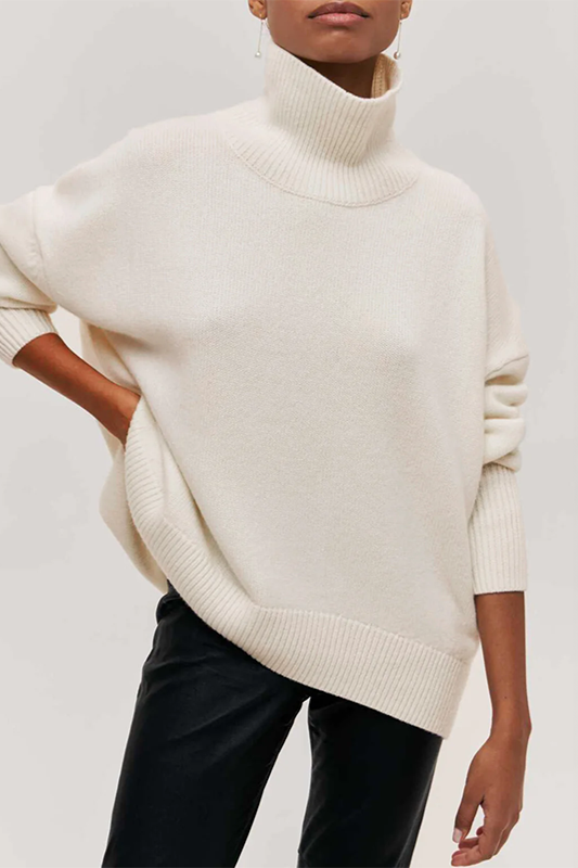 Back view of a comfortable oversized womens knit sweater