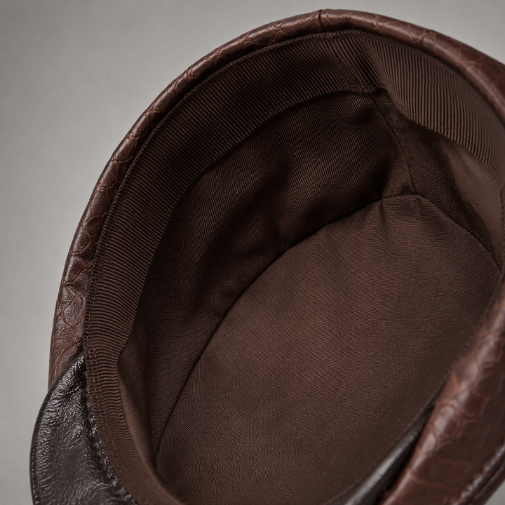 Close up view of premium fabric texture on classic mens flat cap accessory