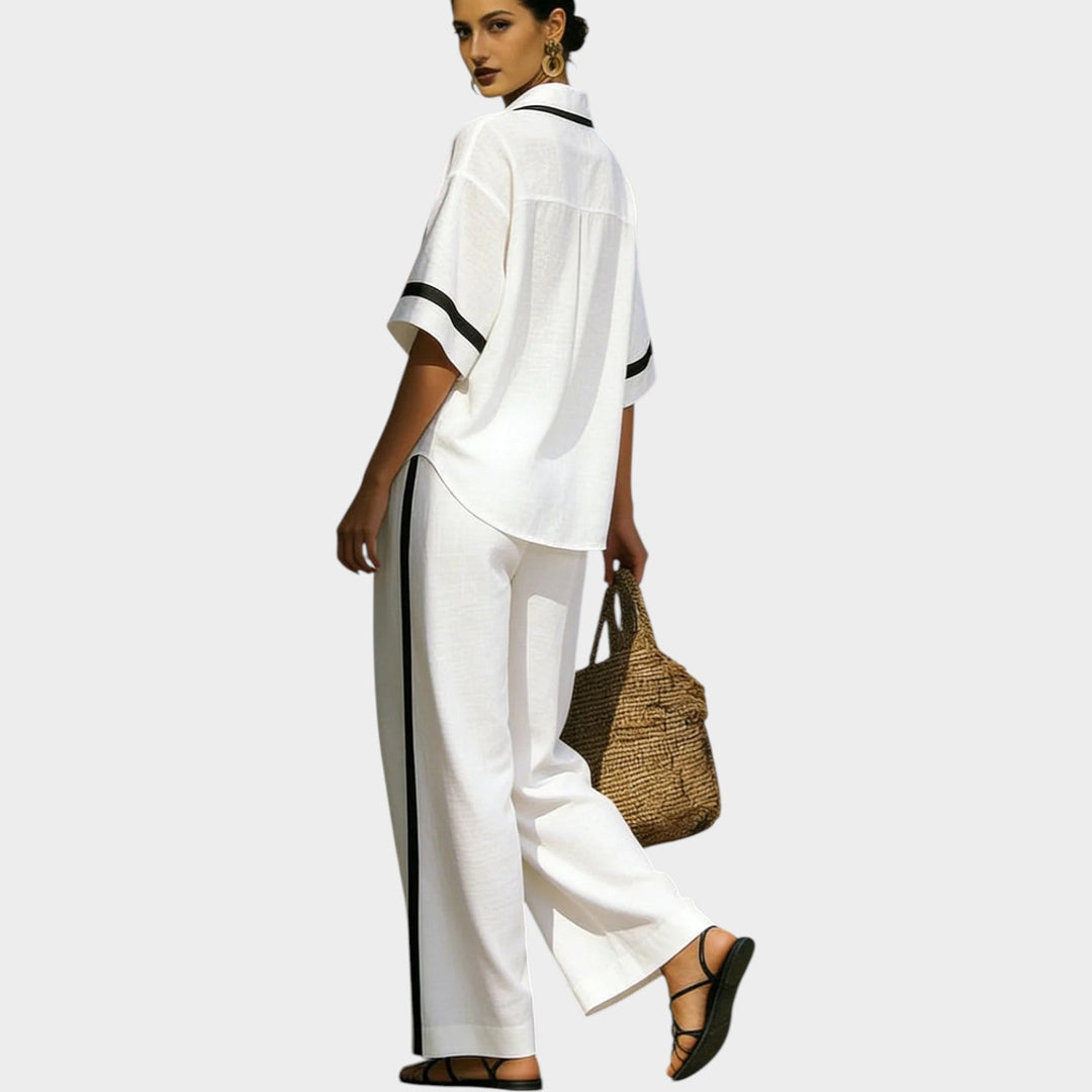 Back view of a model in a white two-piece matching set showcasing the relaxed fit