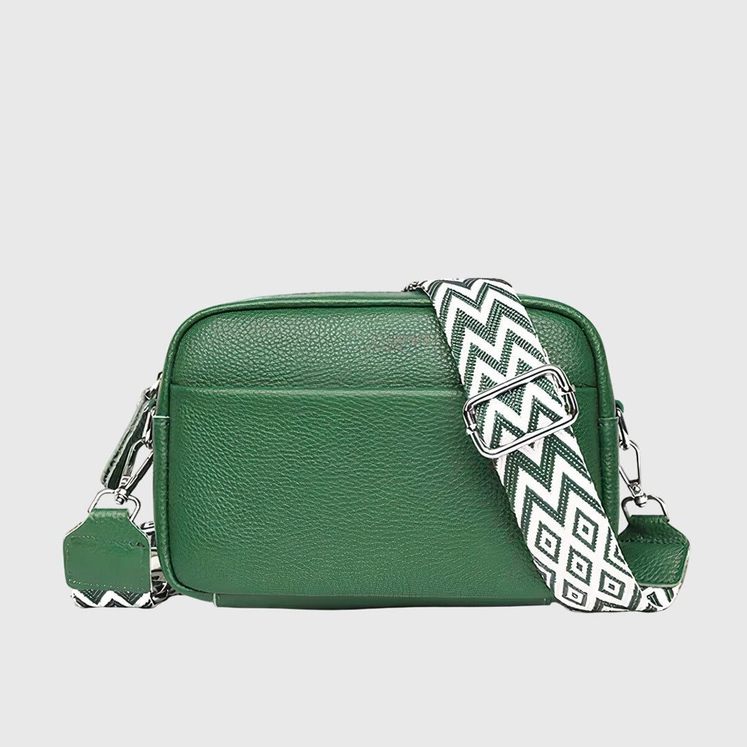 Interior view of the women's crossbody handbag featuring zipper closure and spacious compartments.