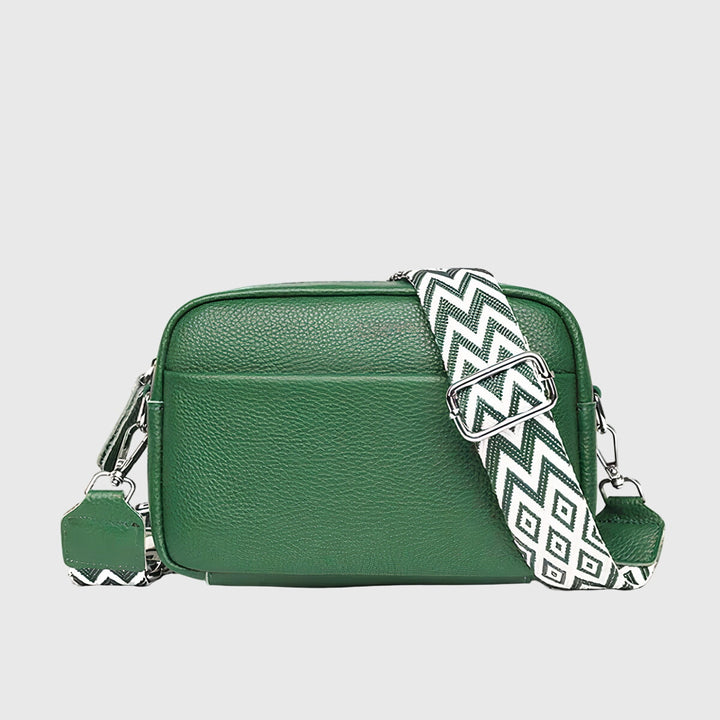 Interior view of the women's crossbody handbag featuring zipper closure and spacious compartments.