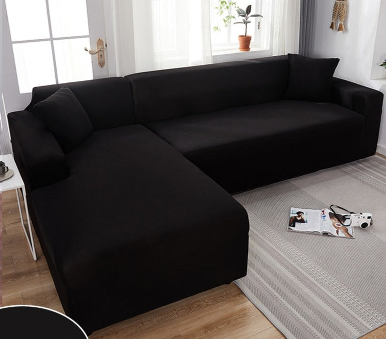Flexible slipcover fitting snugly over modern couch with pet-friendly fabric